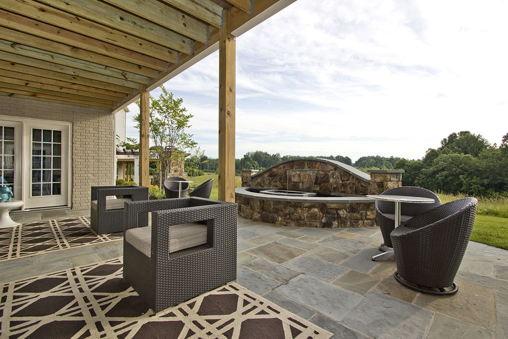 Inspiration for a contemporary patio in DC Metro with a pergola.