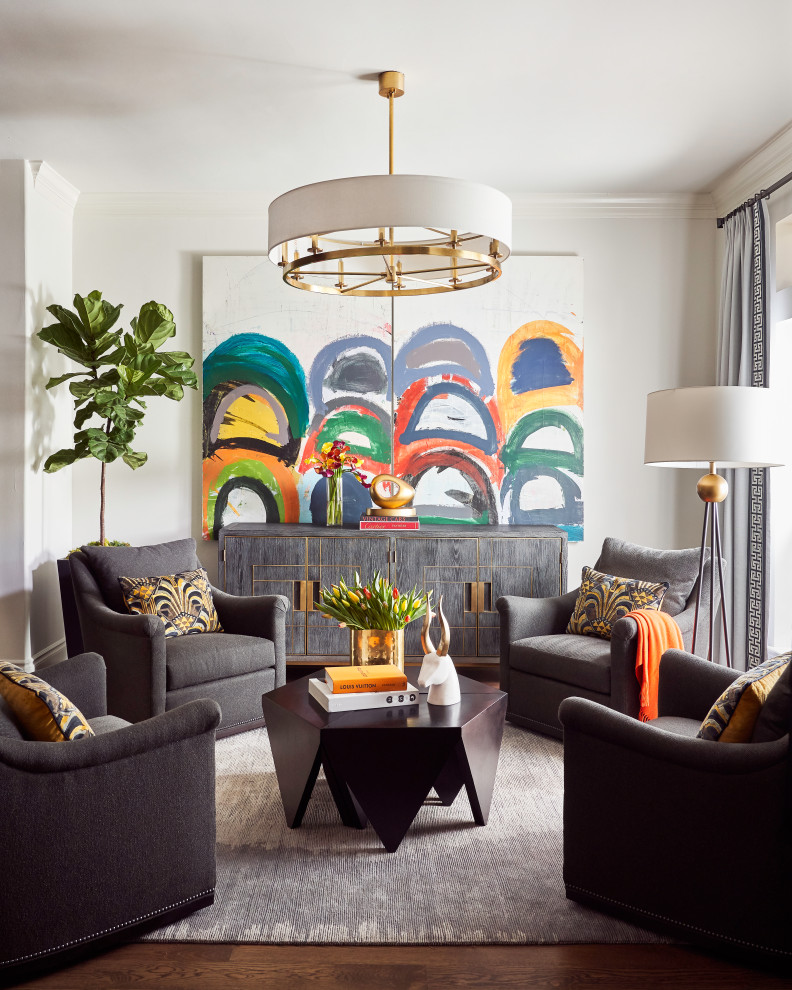 Inspiration for a large transitional medium tone wood floor and brown floor living room remodel in Austin with white walls