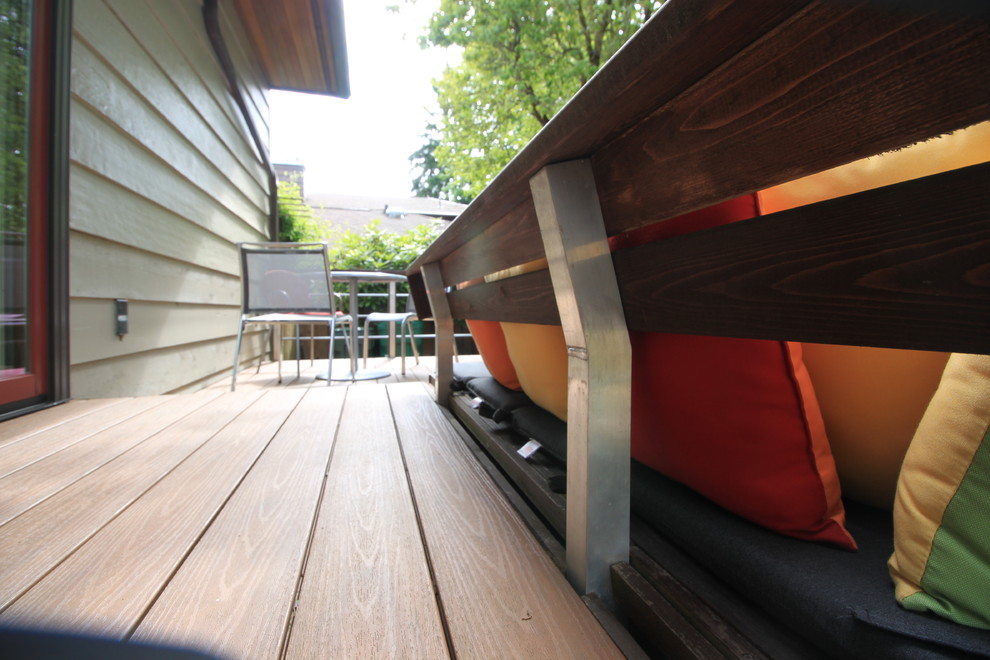 Inspiration for a small modern backyard deck remodel in Seattle with no cover