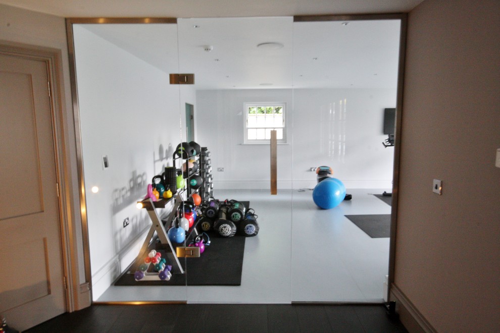 Photo of a contemporary multipurpose gym in Essex with linoleum floors.