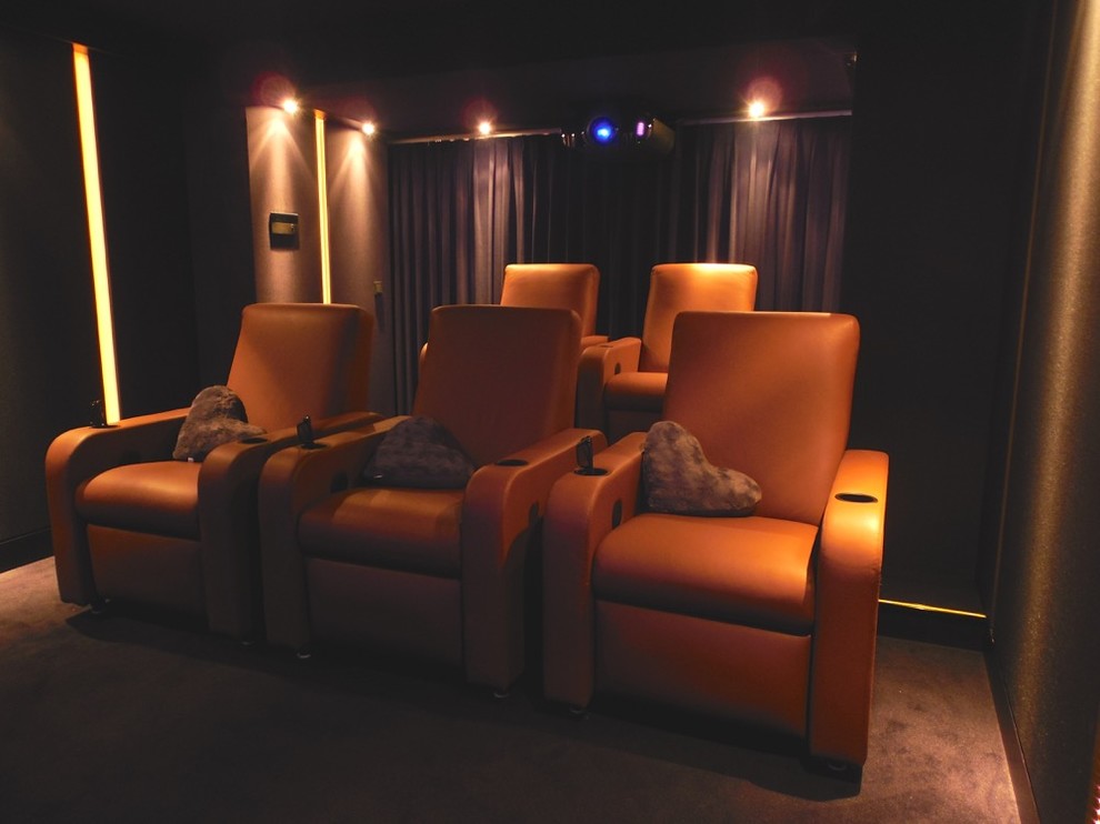 Design ideas for a large modern enclosed home theatre in Minneapolis with purple walls, carpet and a projector screen.