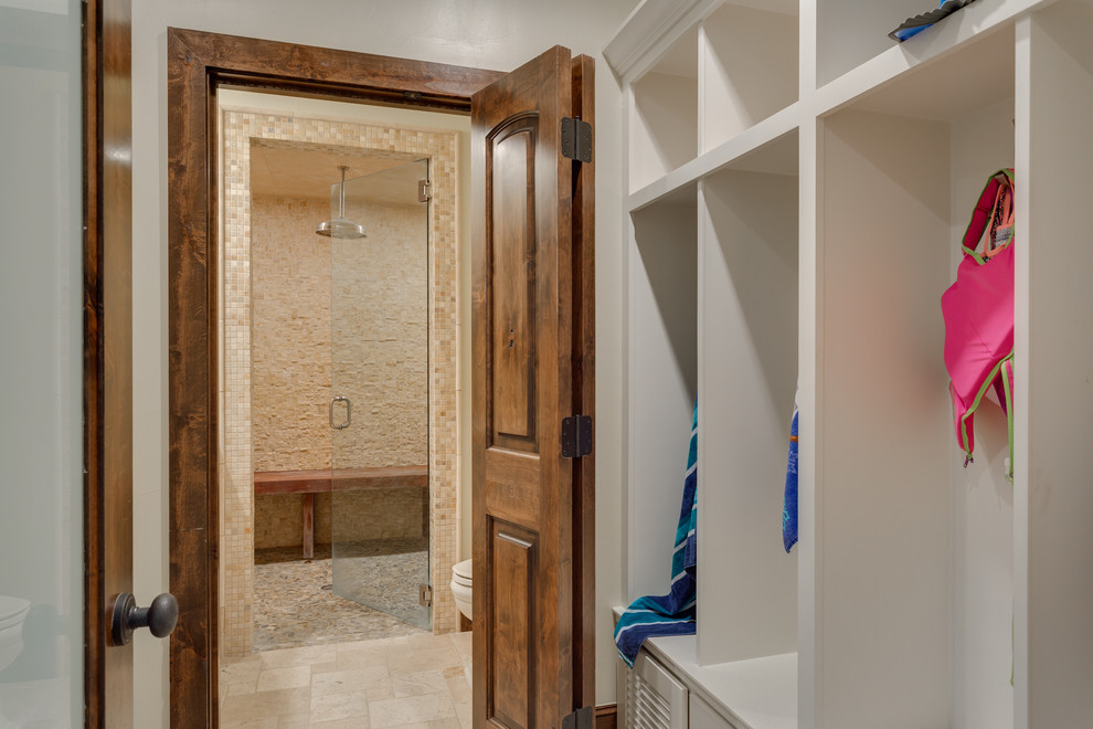 Design ideas for a large traditional bathroom in Dallas with open cabinets, white cabinets, a one-piece toilet, beige tile, stone tile, white walls, travertine floors, with a sauna, an undermount sink, granite benchtops, beige floor, a hinged shower door and a curbless shower.