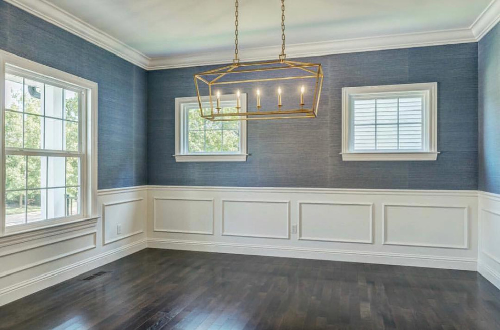 This is an example of a mid-sized transitional kitchen/dining combo in St Louis with blue walls and dark hardwood floors.