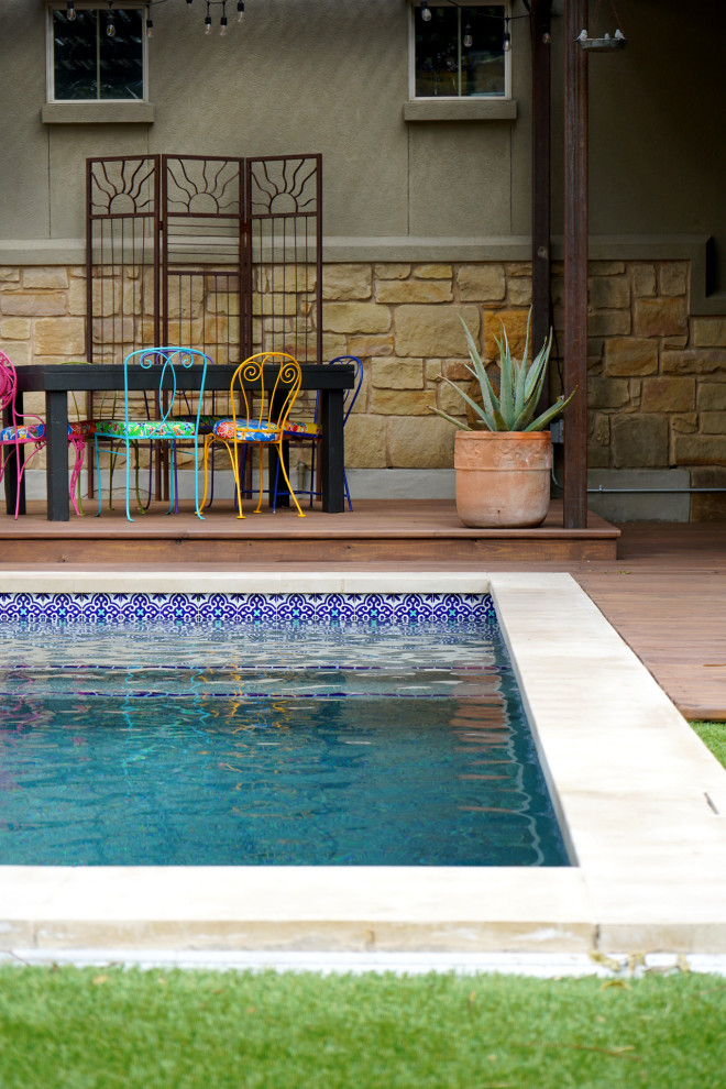 Inspiration for a small side yard pool remodel in Austin