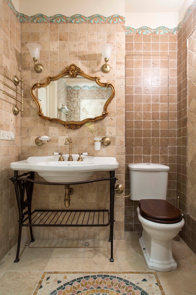 Design ideas for a traditional powder room in Moscow with open cabinets, a two-piece toilet, beige tile, brown tile, a console sink and multi-coloured floor.