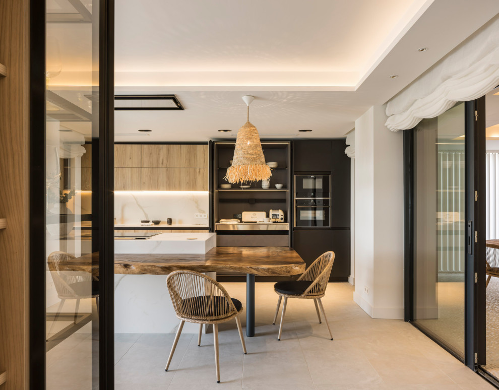Inspiration for an expansive eclectic kitchen in Alicante-Costa Blanca with recessed-panel cabinets, medium wood cabinets and multiple islands.