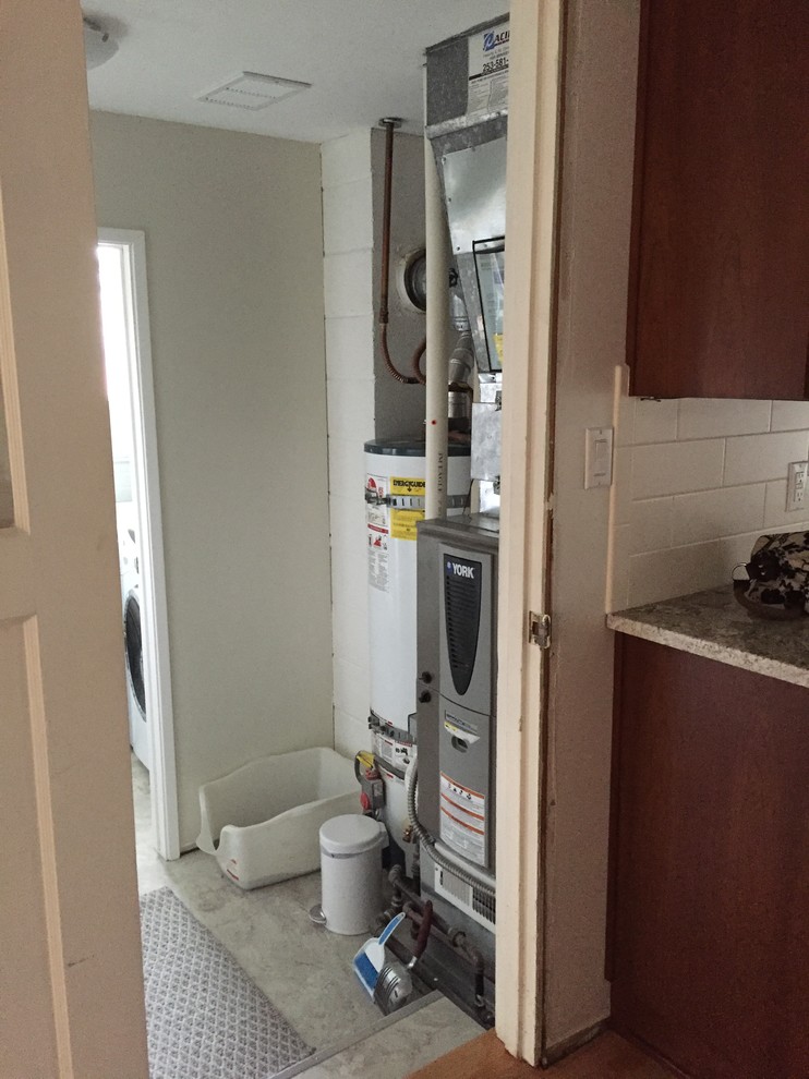Sliding Doors in Furnace/Hot Water Heater Area