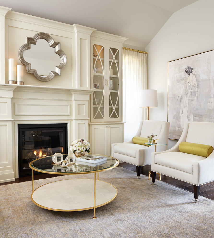 This is an example of a large contemporary formal enclosed living room in Toronto with white walls, a standard fireplace, dark hardwood floors, a wood fireplace surround and no tv.