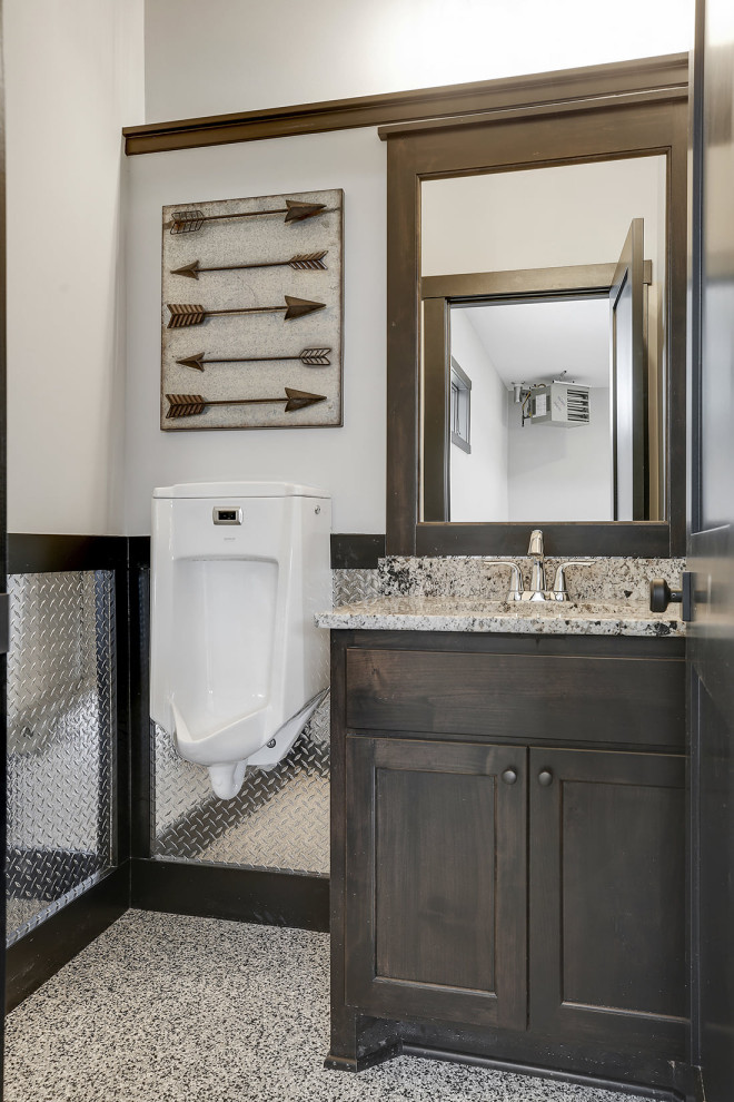 Inspiration for a small country bathroom in Minneapolis with furniture-like cabinets, brown cabinets, an urinal, grey walls, an undermount sink, granite benchtops, grey floor, multi-coloured benchtops, an enclosed toilet, a single vanity and a built-in vanity.