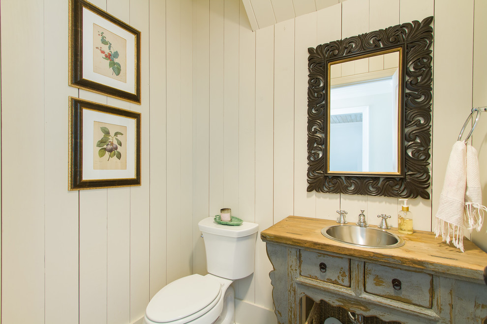 This is an example of a traditional powder room in Atlanta.