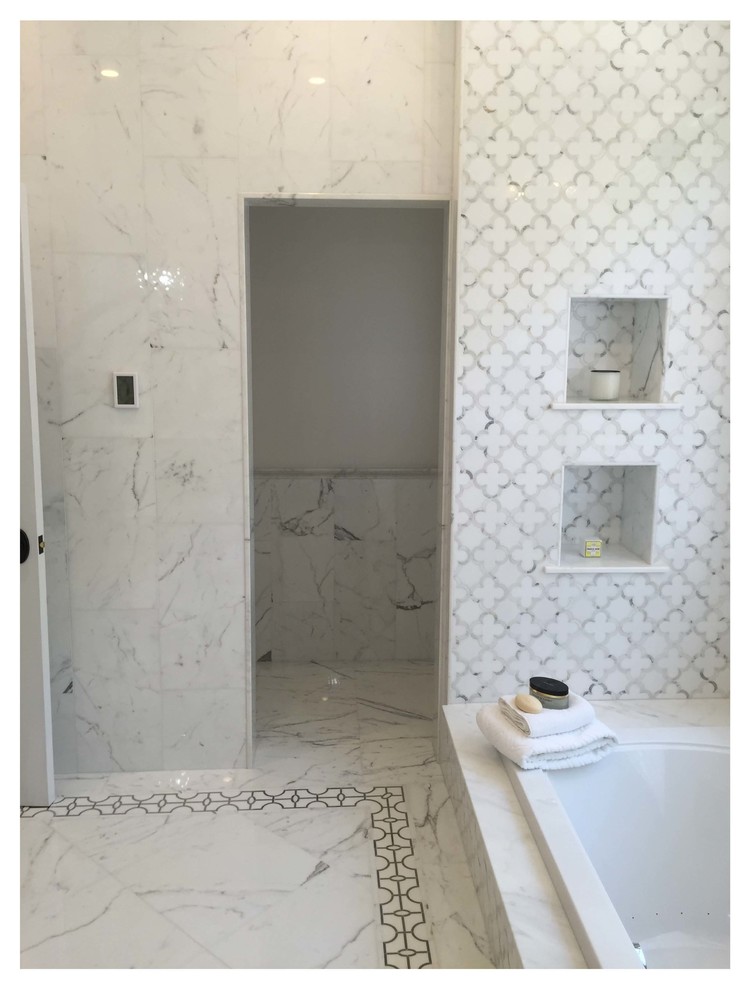 Design ideas for a mid-sized contemporary master bathroom in Toronto with shaker cabinets, black cabinets, an alcove tub, an alcove shower, a two-piece toilet, white tile, stone tile, white walls, marble floors, an undermount sink and marble benchtops.