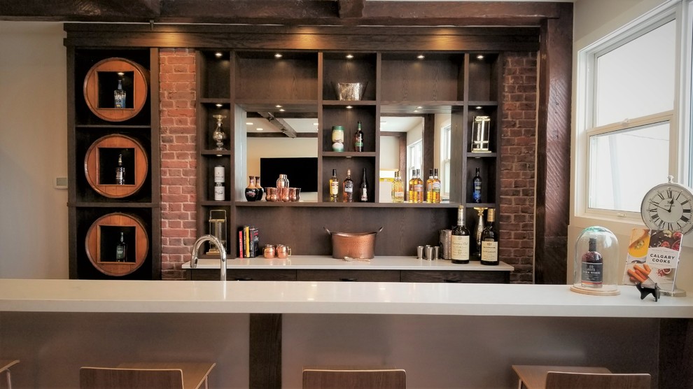 Photo of a mid-sized contemporary single-wall seated home bar in Calgary with open cabinets, dark wood cabinets, quartz benchtops, brown splashback, brick splashback and white benchtop.