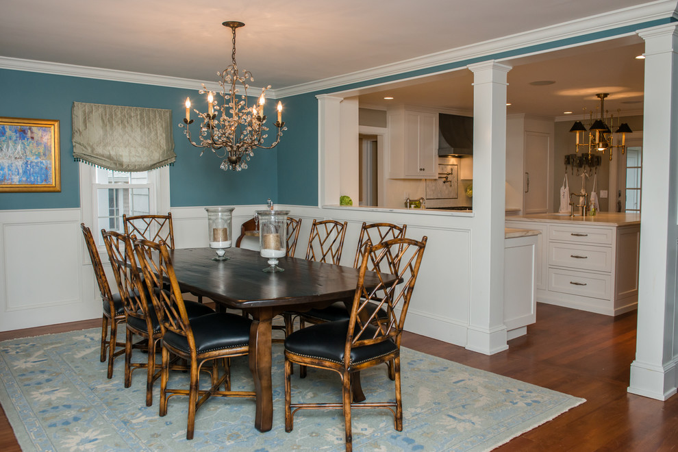 This is an example of a mid-sized traditional separate dining room in Portland Maine with green walls and medium hardwood floors.