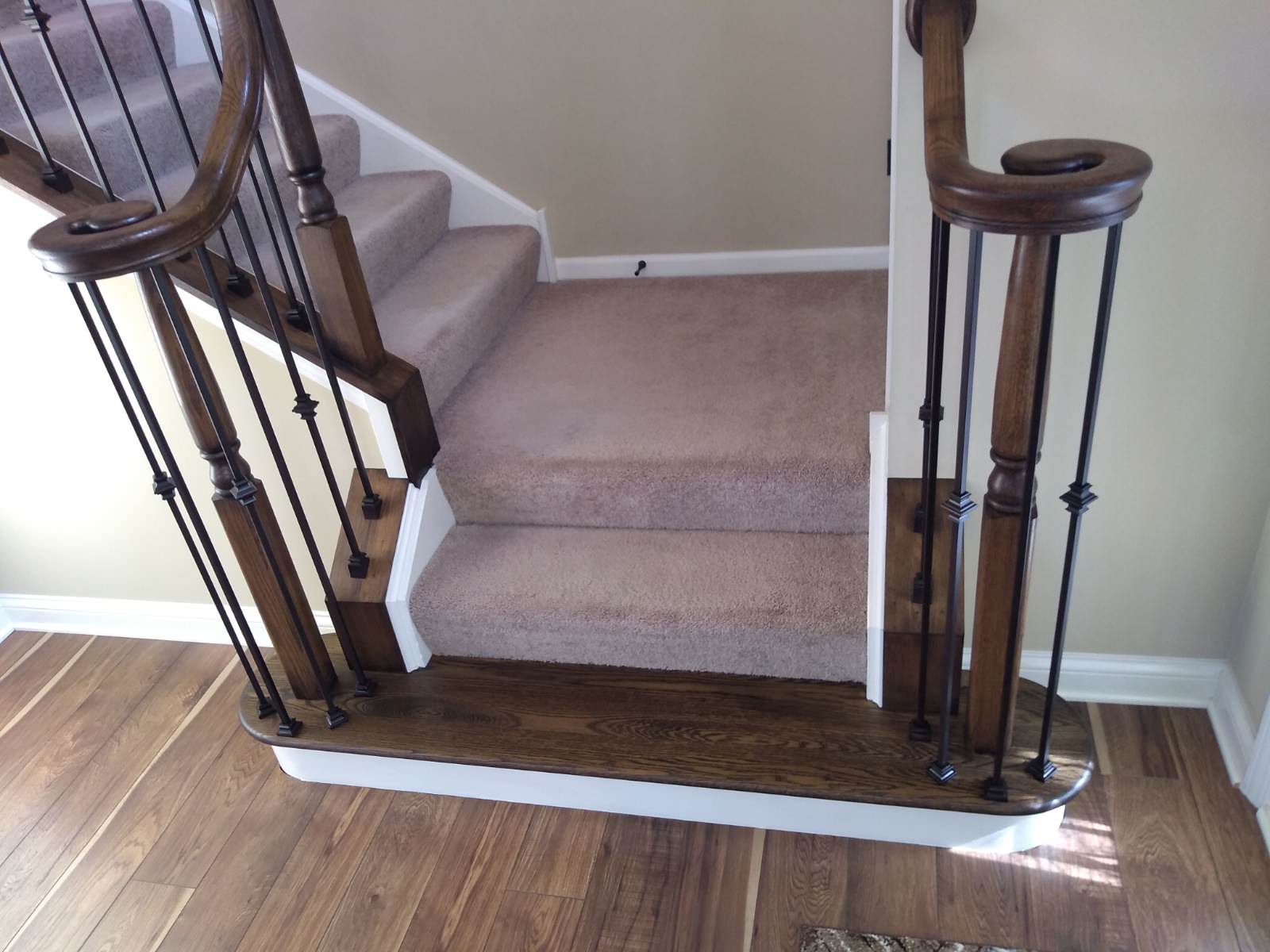 Gel Stained wood and Iron Balusters