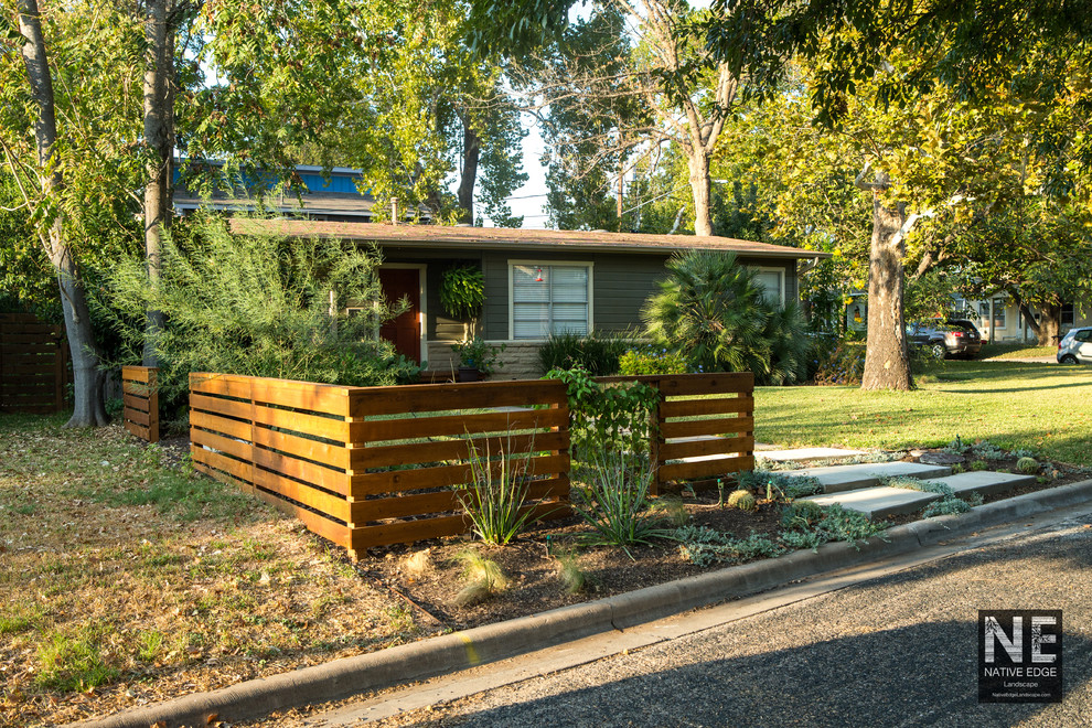 Design ideas for a mid-sized rustic drought-tolerant front yard concrete paver garden path in Austin.