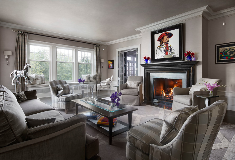 This is an example of a large traditional formal enclosed living room in Chicago with grey walls, a standard fireplace, dark hardwood floors, a concrete fireplace surround, no tv, brown floor and recessed.