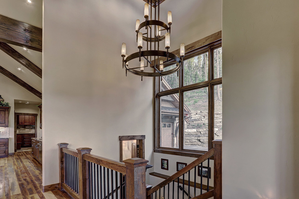 Example of a mountain style home design design in Denver