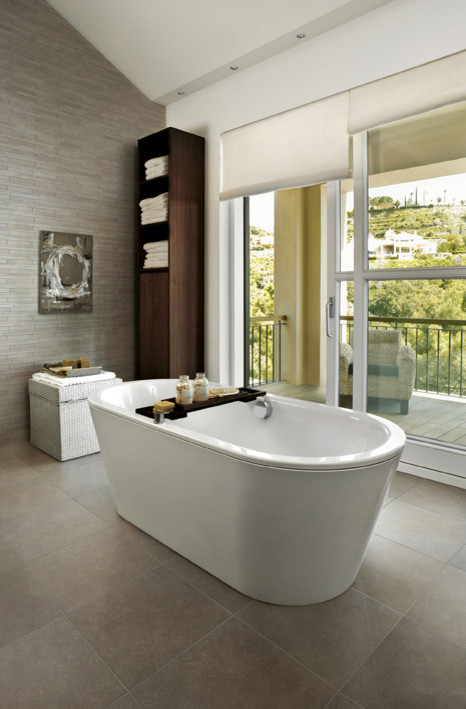 This is an example of a modern bathroom in Sydney with gray tile, porcelain tile and porcelain floors.