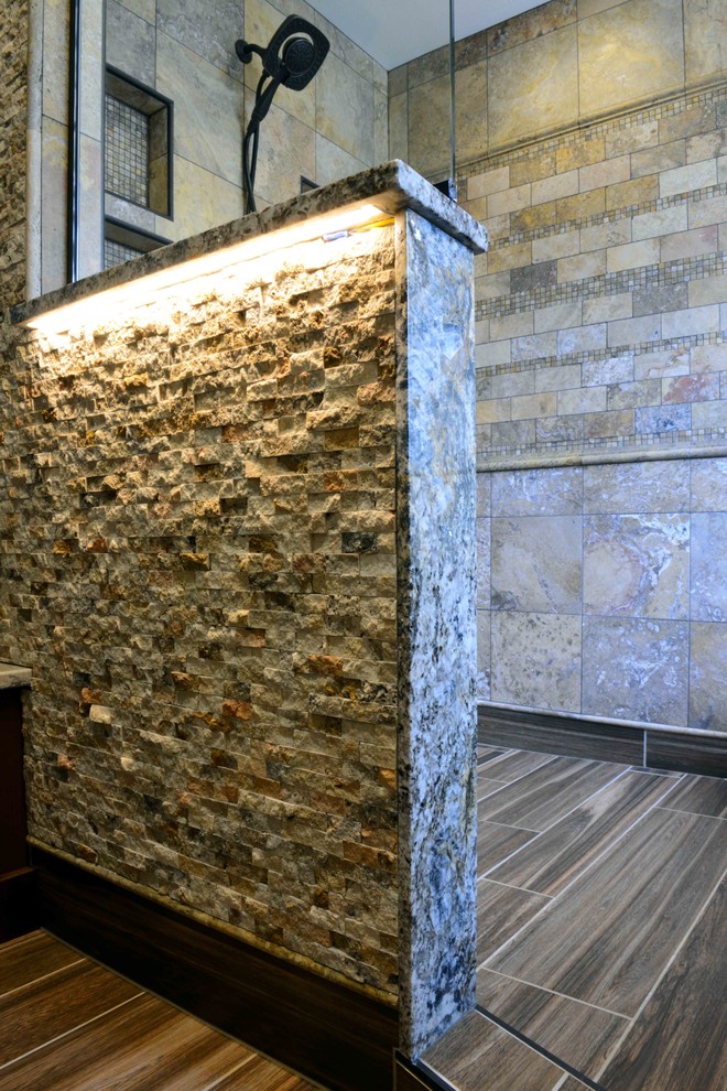 Example of a mid-sized mountain style 3/4 multicolored tile and stone tile ceramic tile home design design with shaker cabinets, dark wood cabinets, a one-piece toilet, gray walls, an undermount sink and granite countertops