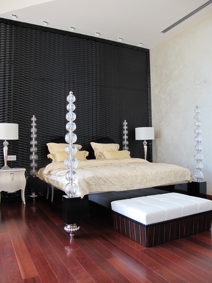 This is an example of a transitional bedroom in Moscow with white walls and medium hardwood floors.