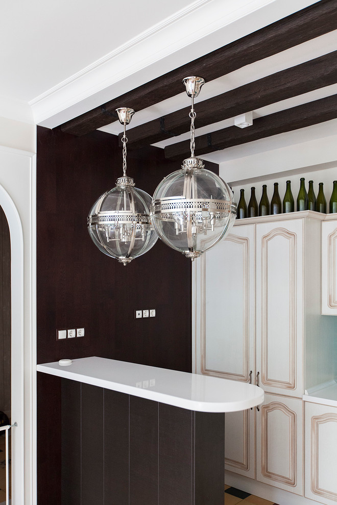 Eclectic kitchen in Moscow with white cabinets and a peninsula.