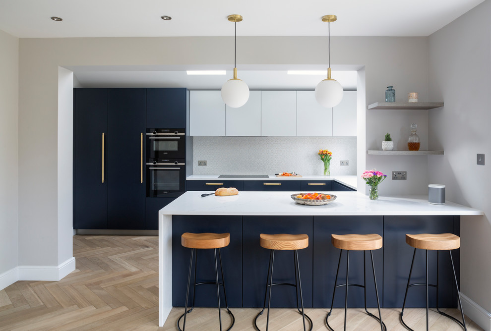Blue & White Handless Kitchen Contemporary Kitchen London by