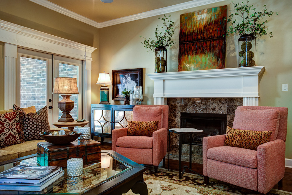 Mid-sized transitional open concept living room in Little Rock with dark hardwood floors, a standard fireplace, a tile fireplace surround, a wall-mounted tv, brown floor and beige walls.