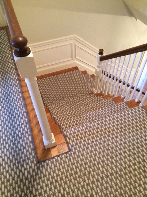 Large transitional carpeted l-shaped staircase photo in Boston with carpeted risers
