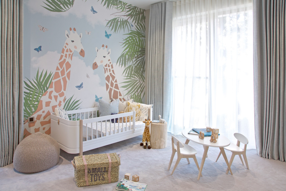 Large contemporary nursery in London with grey walls, carpet and grey floor for girls.