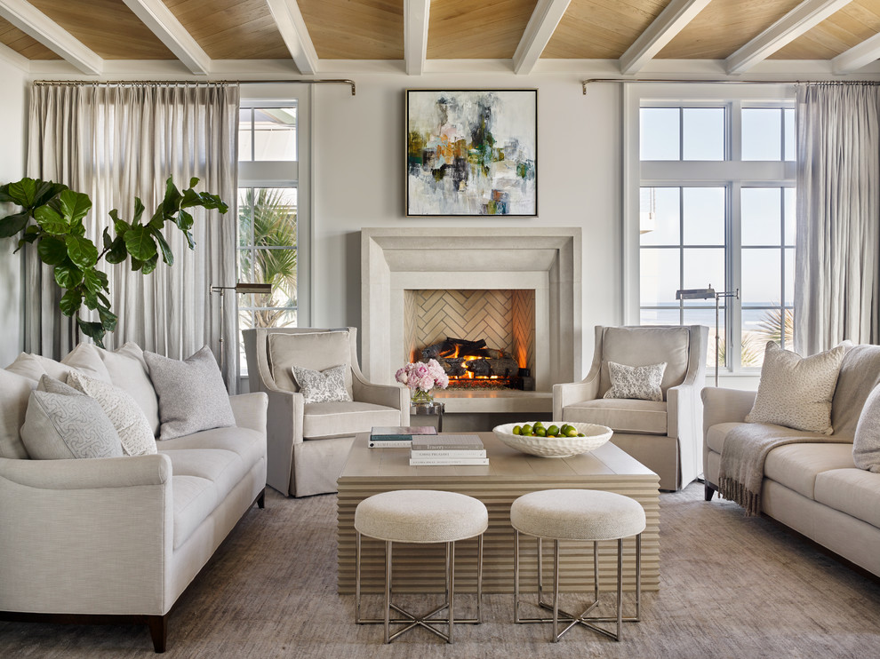 Beach style formal living room in Jacksonville with white walls, a standard fireplace and no tv.