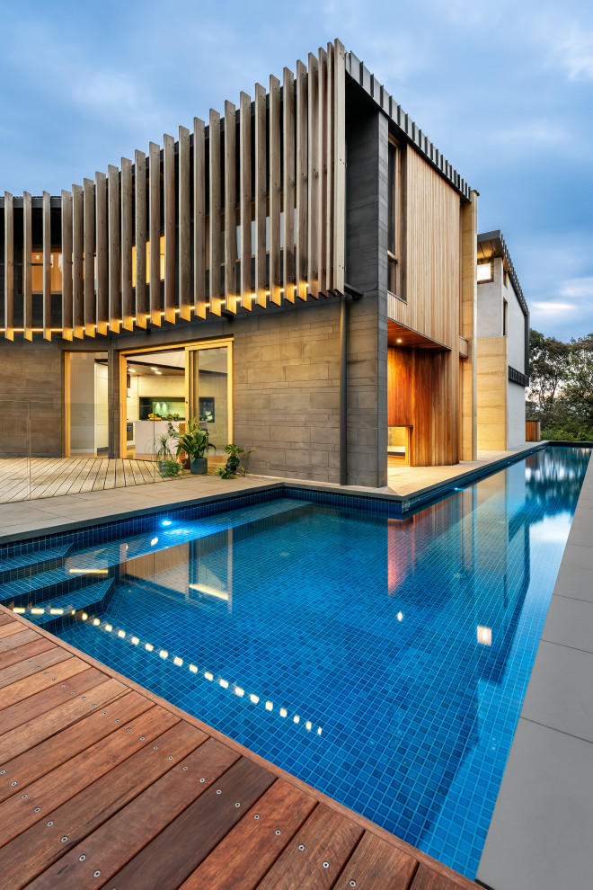 Design ideas for an expansive contemporary pool in Melbourne.