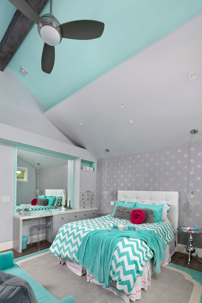 This is an example of a mid-sized transitional kids' room for girls in San Francisco with multi-coloured walls.