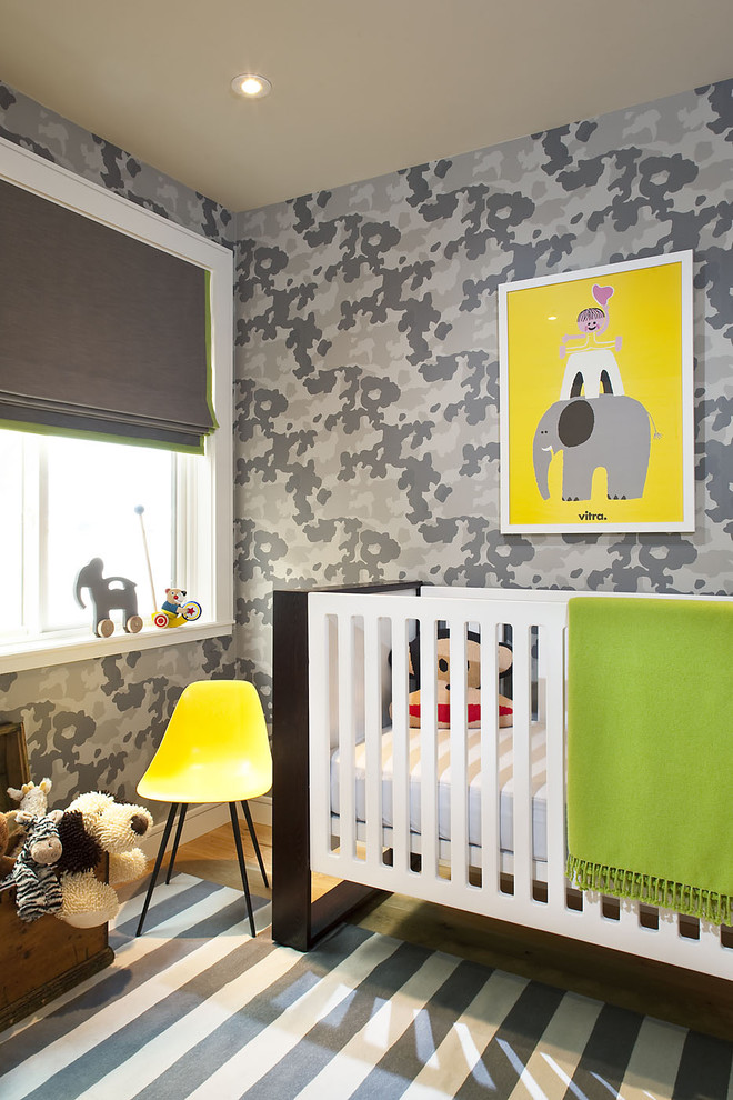 Design ideas for a transitional gender-neutral nursery in San Francisco with grey walls.