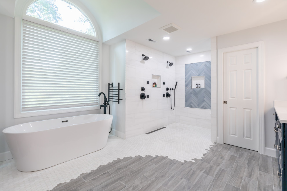 Bathroom - mid-sized contemporary master white tile wood-look tile floor, gray floor and double-sink bathroom idea in DC Metro with beaded inset cabinets, black cabinets, a one-piece toilet, white walls, an undermount sink, white countertops and a built-in vanity