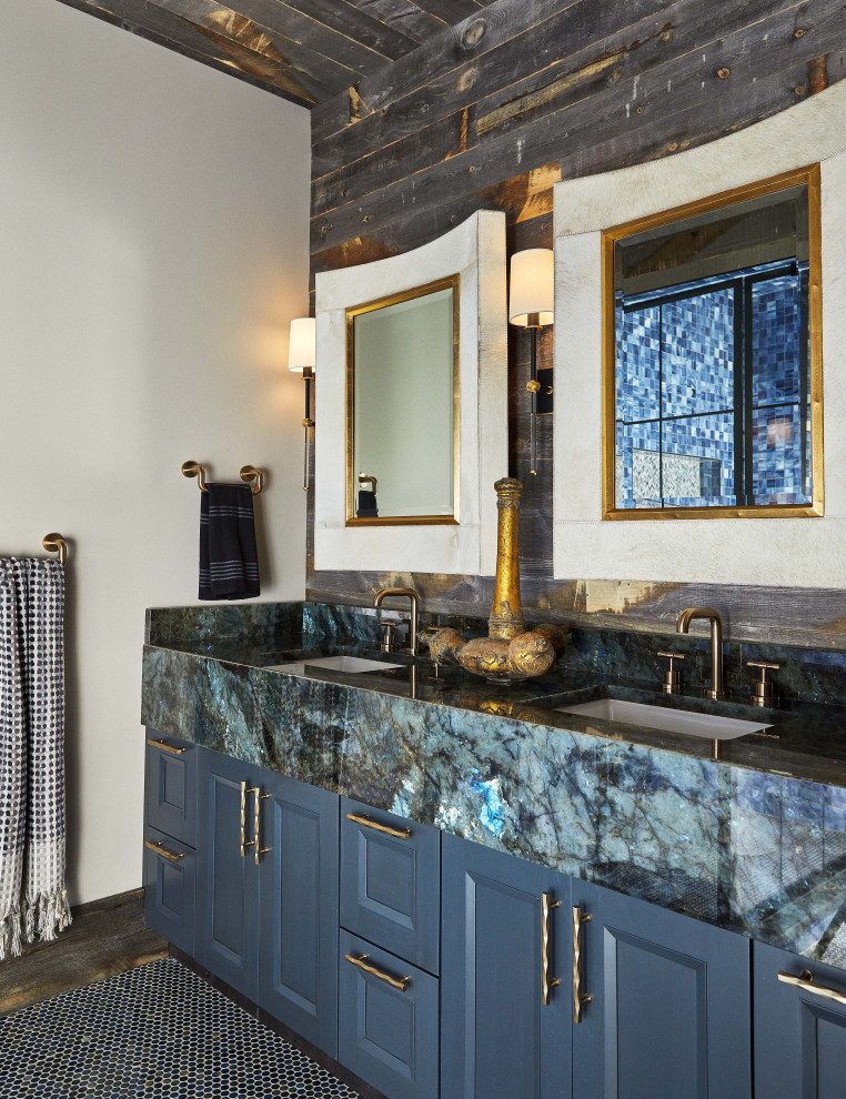 This is an example of a country bathroom in Other with shaker cabinets, blue cabinets, white walls, dark hardwood floors, a drop-in sink, marble benchtops, brown floor, turquoise benchtops, a double vanity, a built-in vanity, wood and wood walls.