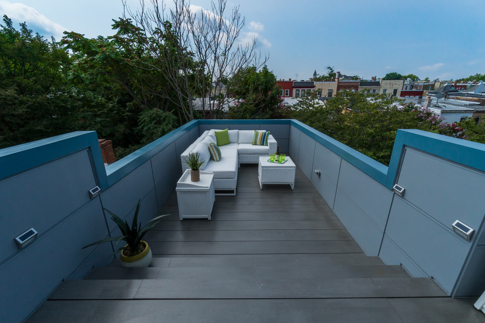 Photo of a mid-sized contemporary rooftop deck in DC Metro with no cover.