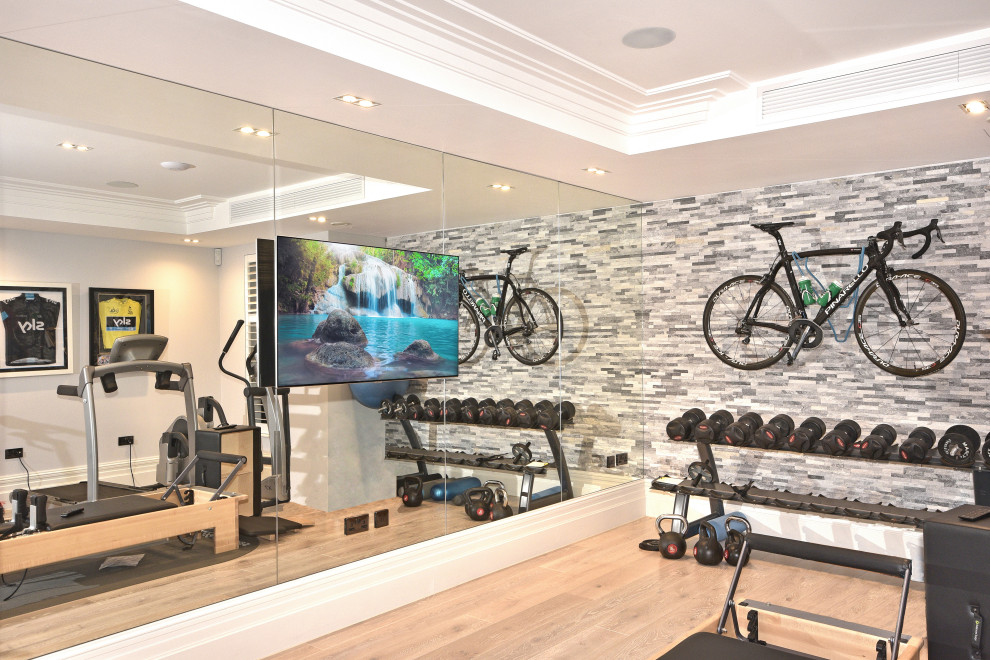 Inspiration for a contemporary home gym in Sussex.