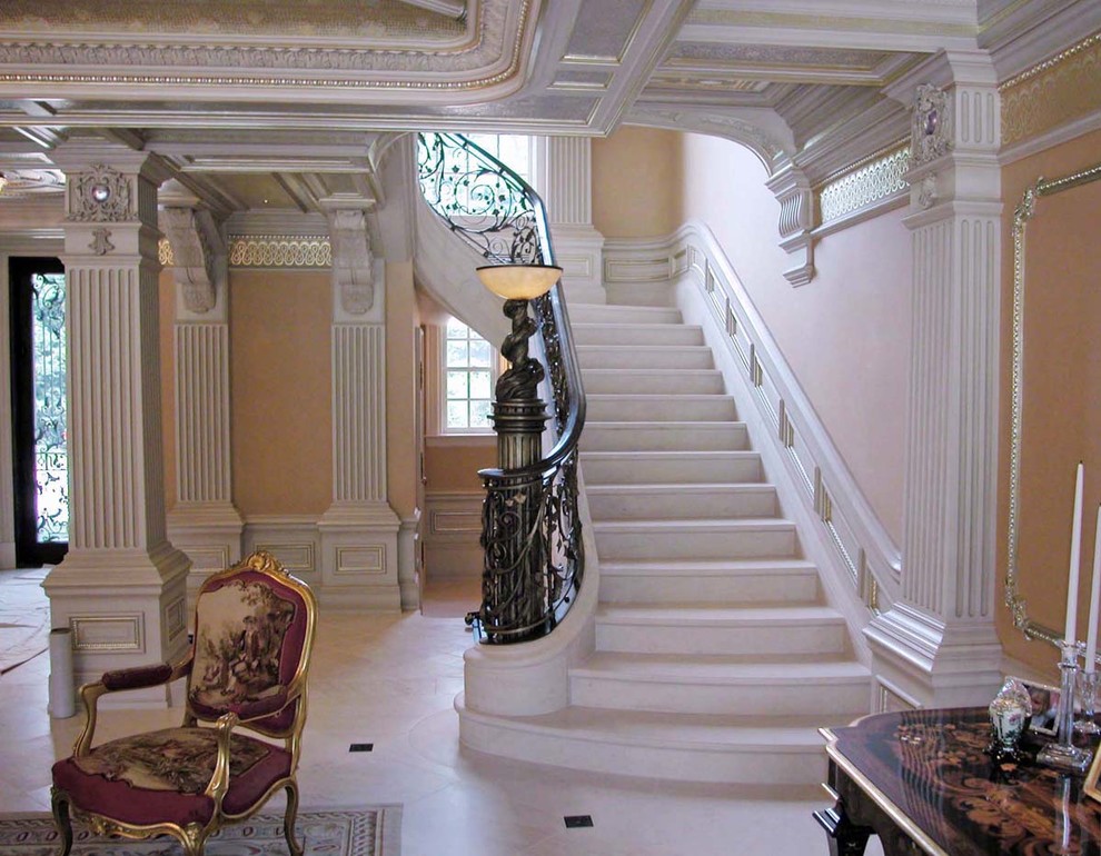 Expansive traditional curved staircase in Boston.