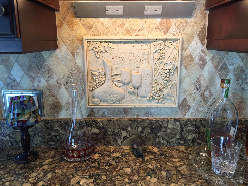 Eat-in kitchen - mid-sized traditional l-shaped porcelain tile eat-in kitchen idea in Miami with a single-bowl sink, raised-panel cabinets, dark wood cabinets, quartz countertops, beige backsplash, stone tile backsplash, stainless steel appliances and a peninsula