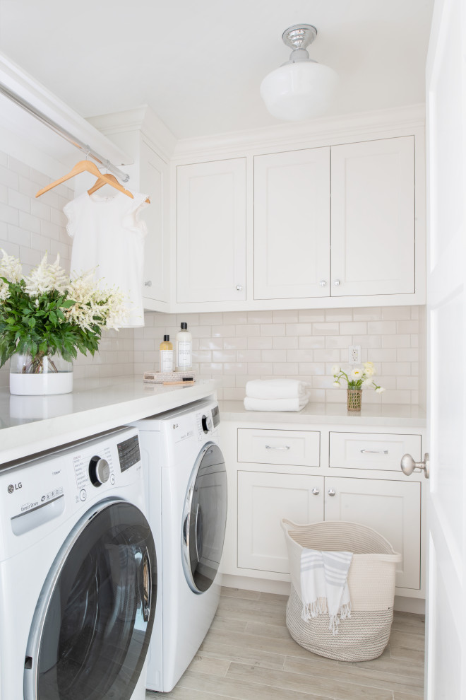 Design ideas for a beach style laundry room in Milwaukee.