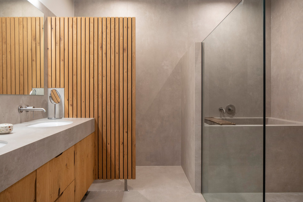 Inspiration for a mid-sized contemporary master gray tile and ceramic tile ceramic tile, gray floor and double-sink bathroom remodel in Berlin with flat-panel cabinets, medium tone wood cabinets, an undermount sink, tile countertops, gray countertops and a floating vanity