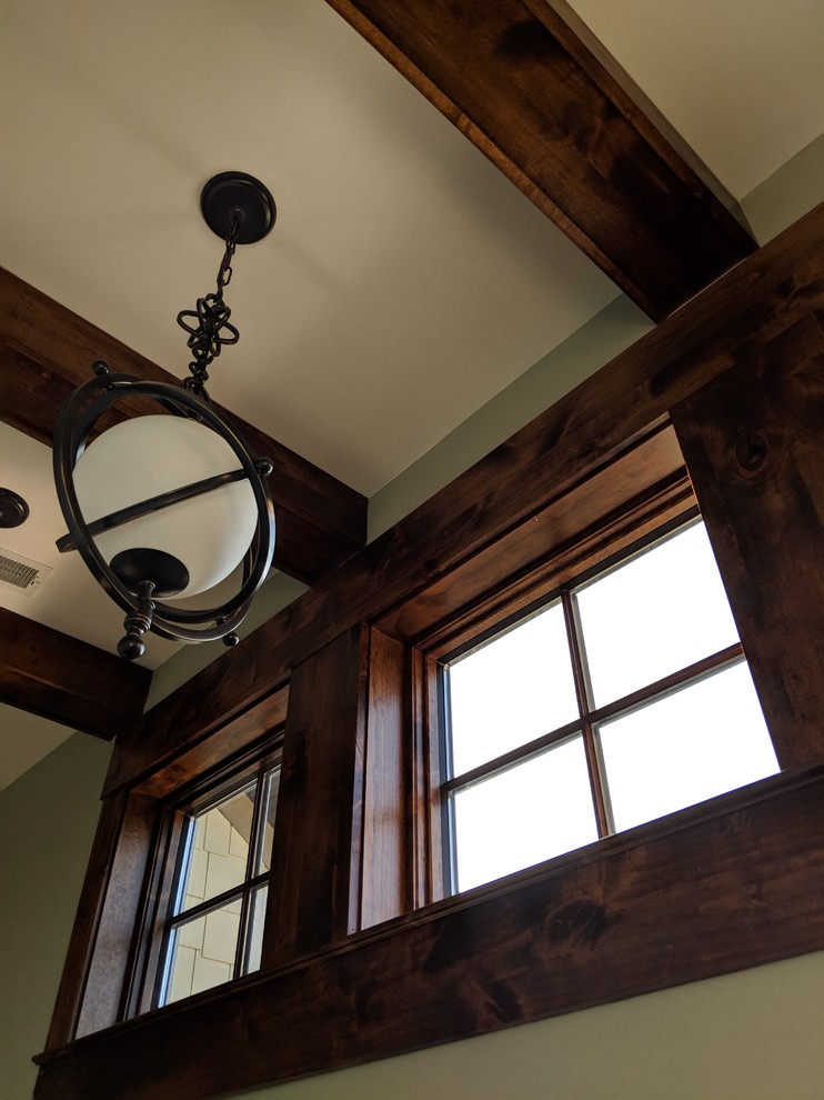 Mid-sized mountain style dark wood floor and brown floor hallway photo in Chicago with green walls