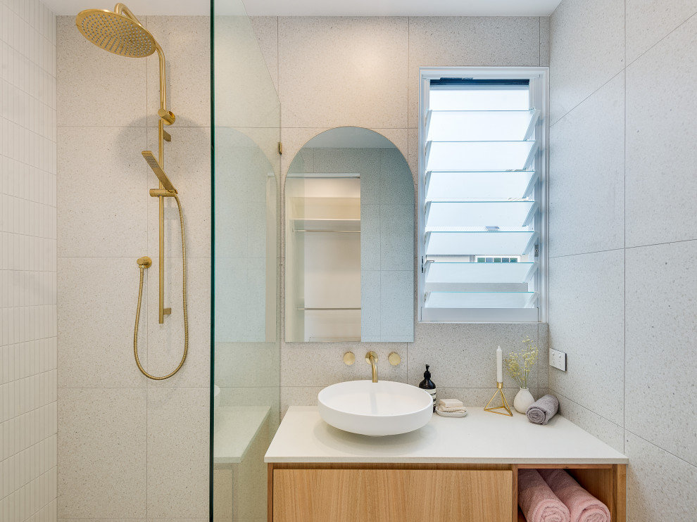 Mid-sized contemporary bathroom in Brisbane with white tile, terrazzo floors, an open shower, a double vanity and a floating vanity.