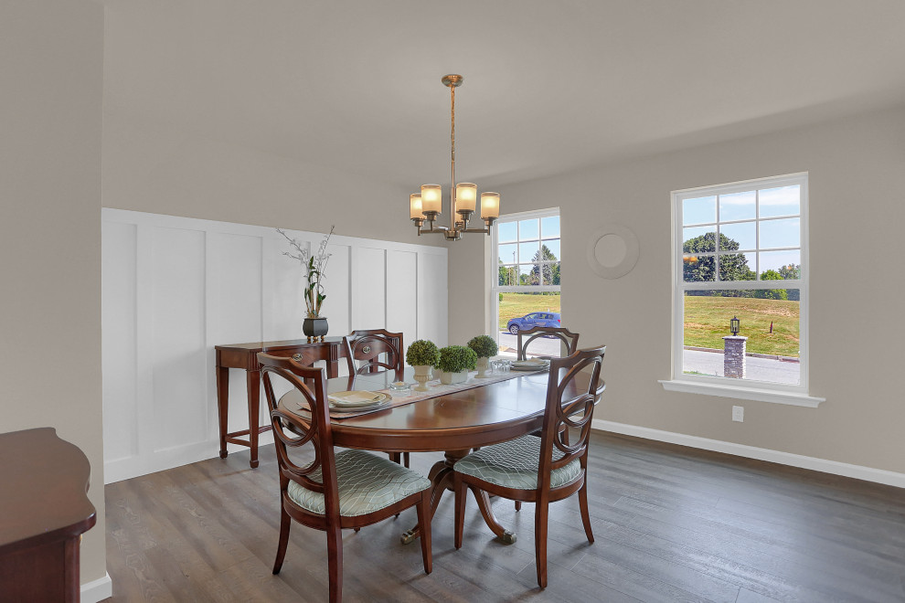 Design ideas for a mid-sized transitional separate dining room in Other with beige walls, vinyl floors, brown floor and decorative wall panelling.