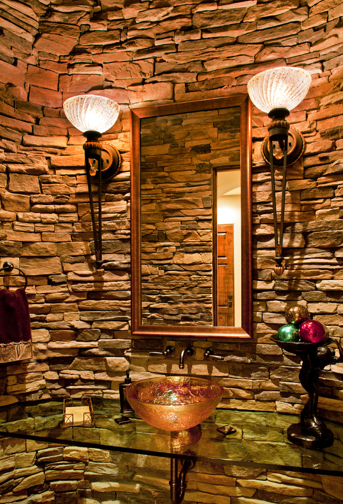 This is an example of a mediterranean powder room in Phoenix.