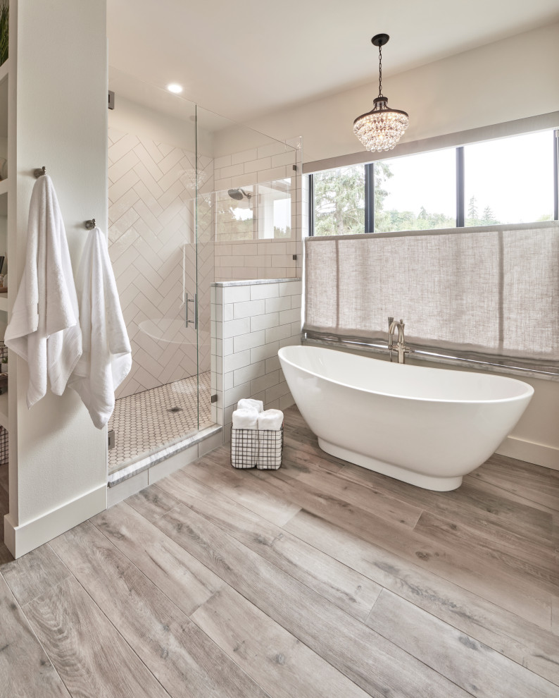Inspiration for a large cottage master white tile and ceramic tile beige floor and double-sink bathroom remodel in Seattle with recessed-panel cabinets, brown cabinets, a one-piece toilet, white walls, an undermount sink, granite countertops, a hinged shower door, black countertops and a built-in vanity