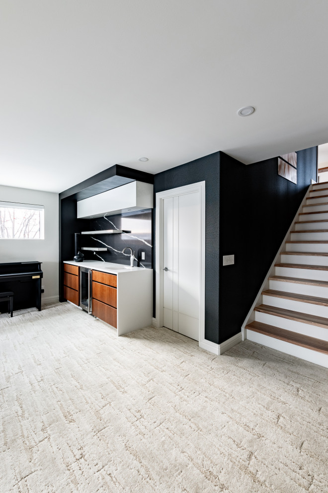 This is an example of a large contemporary basement in Calgary with white walls, carpet, beige floor, wallpaper and wallpaper.