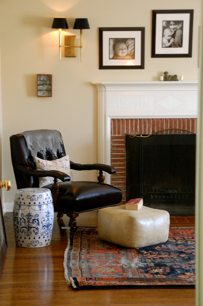 Design ideas for a country bedroom in Los Angeles with a brick fireplace surround and a standard fireplace.