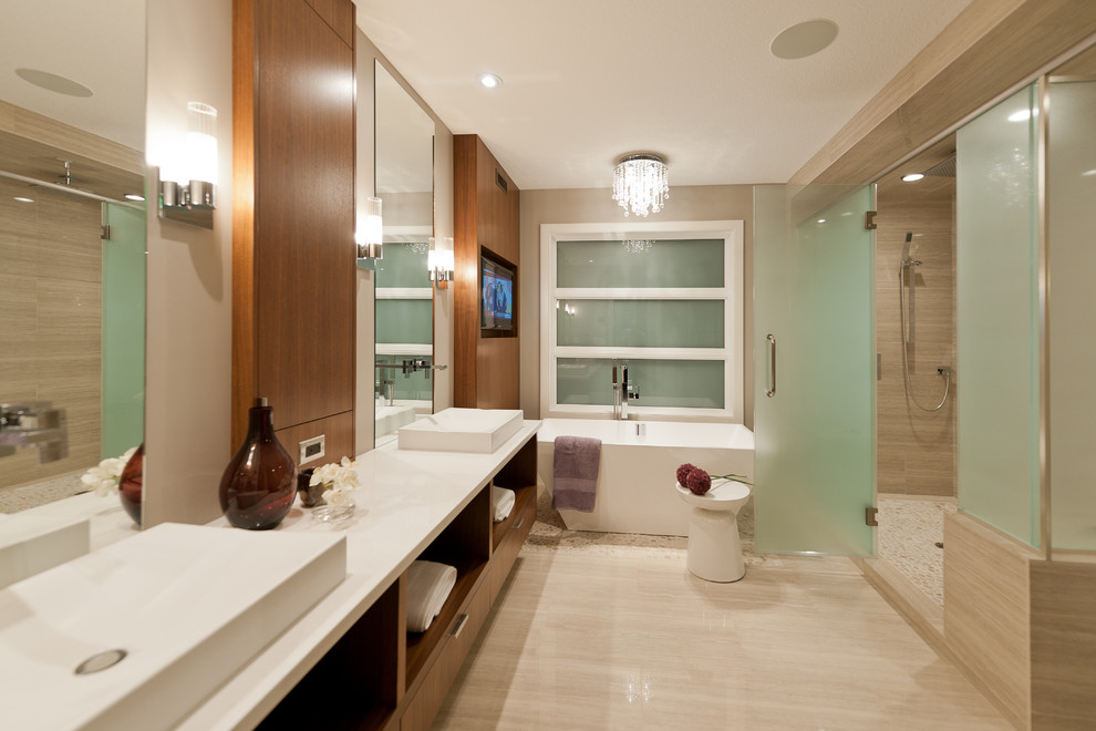 Inspiration for a mid-sized contemporary master bathroom in Other with a drop-in sink, flat-panel cabinets, dark wood cabinets, glass benchtops, a freestanding tub, a corner shower, white tile, porcelain tile, white walls and porcelain floors.