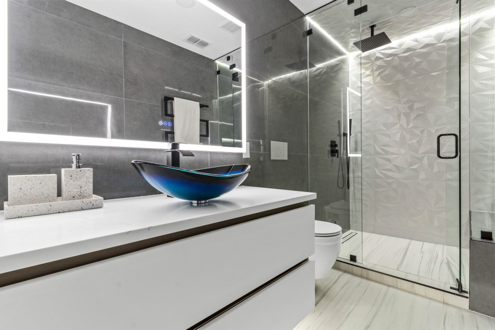 Design ideas for a small modern bathroom in Dallas with flat-panel cabinets, white cabinets, a wall mounted toilet, grey tiles, ceramic tiles, ceramic flooring, a pedestal sink, quartz worktops, white floors, a hinged door, white worktops, a shower bench, a single sink and a floating vanity unit.